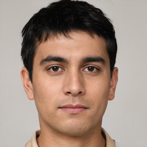 Neutral white young-adult male with short  black hair and brown eyes