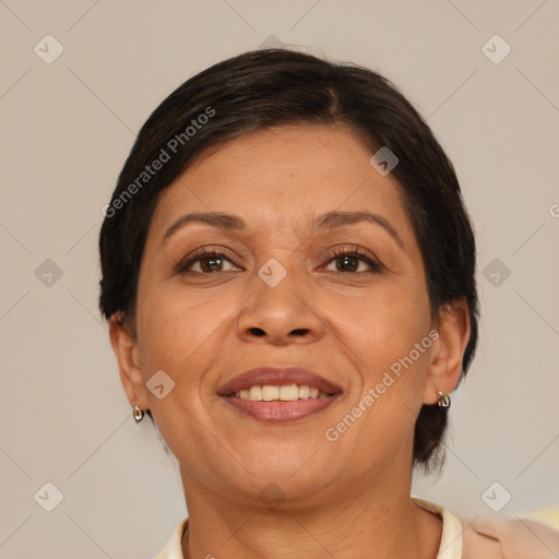 Joyful white adult female with medium  brown hair and brown eyes