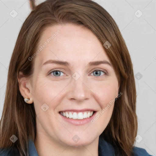 Joyful white young-adult female with long  brown hair and blue eyes