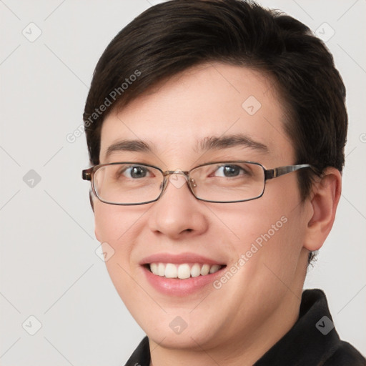 Joyful white young-adult female with short  brown hair and brown eyes