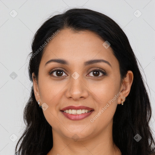 Joyful latino young-adult female with long  black hair and brown eyes