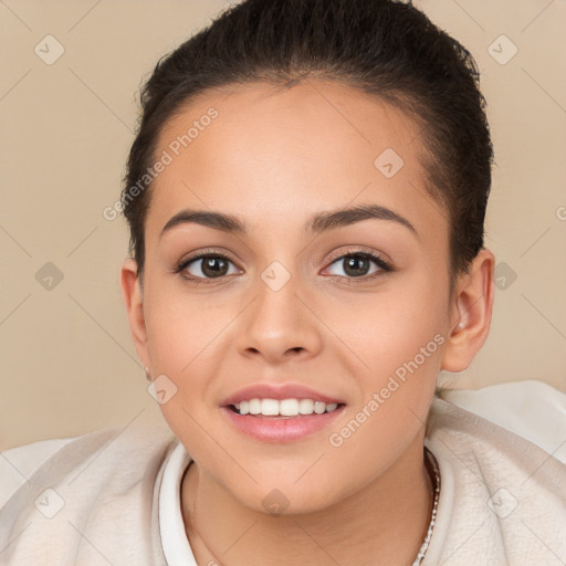 Joyful white young-adult female with short  brown hair and brown eyes