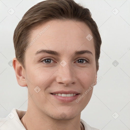 Joyful white young-adult female with short  brown hair and grey eyes