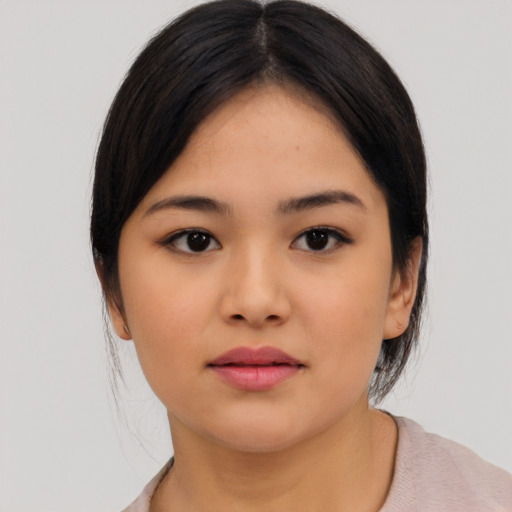 Neutral asian young-adult female with medium  black hair and brown eyes