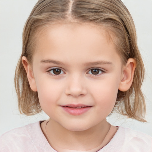 Joyful white child female with medium  brown hair and brown eyes