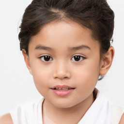 Joyful white child female with short  brown hair and brown eyes