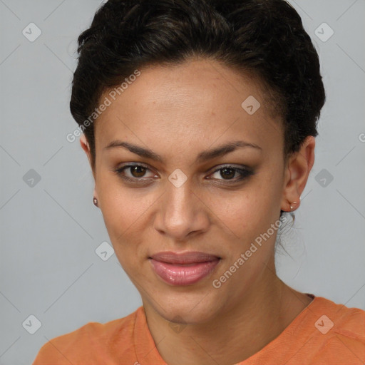 Joyful black young-adult female with short  brown hair and brown eyes