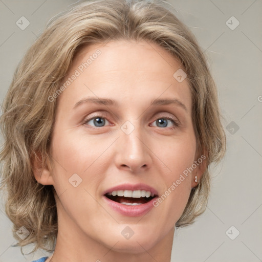 Joyful white young-adult female with medium  brown hair and blue eyes