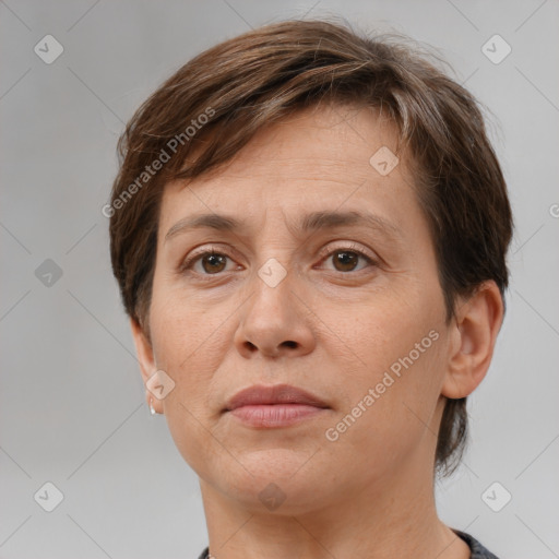 Neutral white adult female with short  brown hair and brown eyes