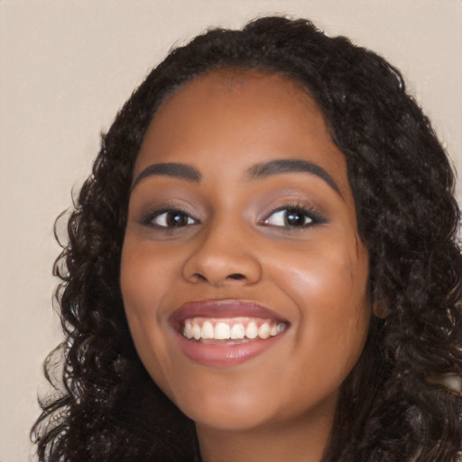 Joyful latino young-adult female with long  black hair and brown eyes