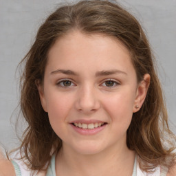 Joyful white child female with medium  brown hair and brown eyes