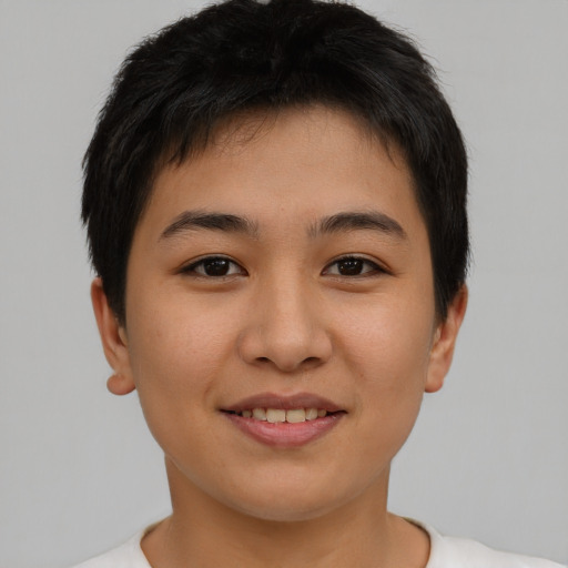 Joyful asian young-adult female with short  brown hair and brown eyes