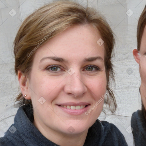 Joyful white young-adult female with medium  brown hair and blue eyes