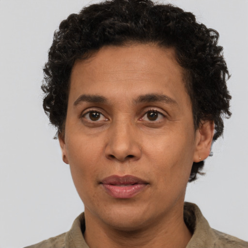 Neutral latino adult male with short  brown hair and brown eyes