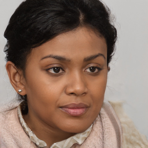 Neutral black young-adult female with short  brown hair and brown eyes