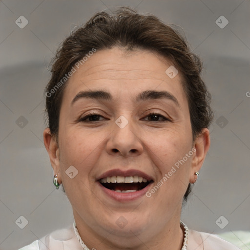 Joyful white adult female with short  brown hair and brown eyes