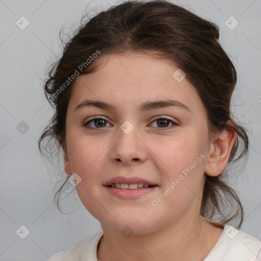 Joyful white child female with medium  brown hair and brown eyes