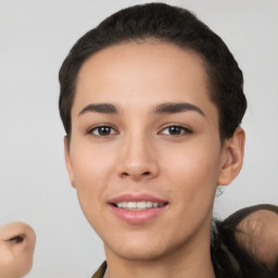 Joyful white young-adult female with short  black hair and brown eyes