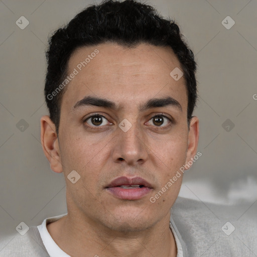 Neutral white adult male with short  black hair and brown eyes