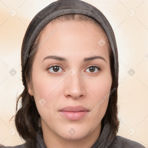 Neutral white young-adult female with long  brown hair and brown eyes