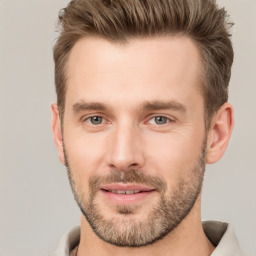 Joyful white adult male with short  brown hair and brown eyes