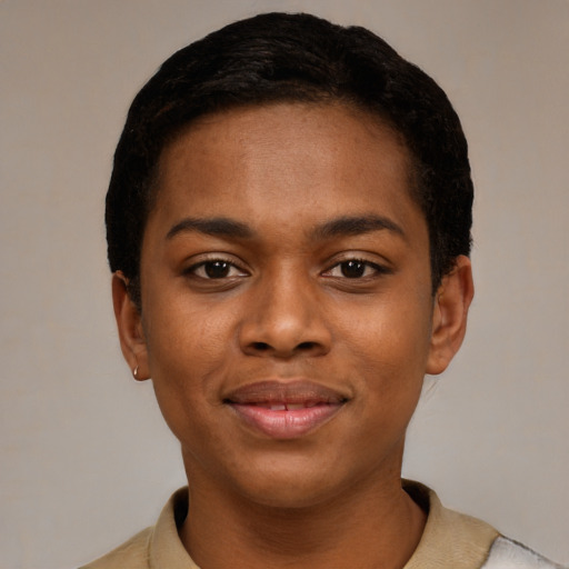 Joyful black young-adult female with short  black hair and brown eyes