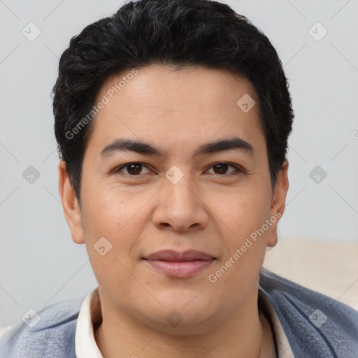 Joyful asian young-adult male with short  brown hair and brown eyes