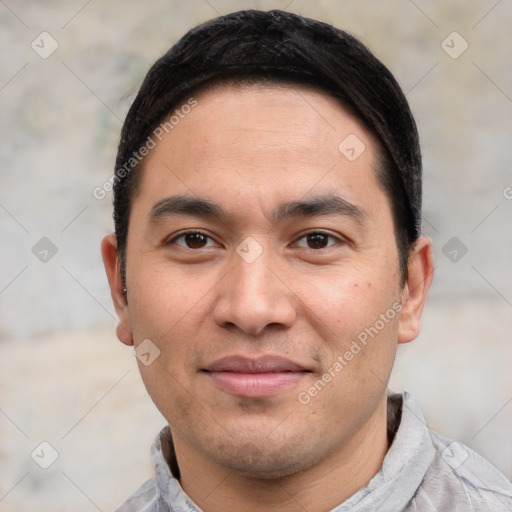 Joyful white young-adult male with short  black hair and brown eyes