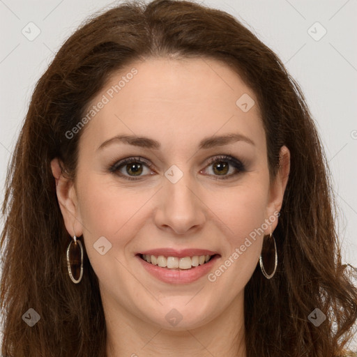 Joyful white young-adult female with long  brown hair and green eyes