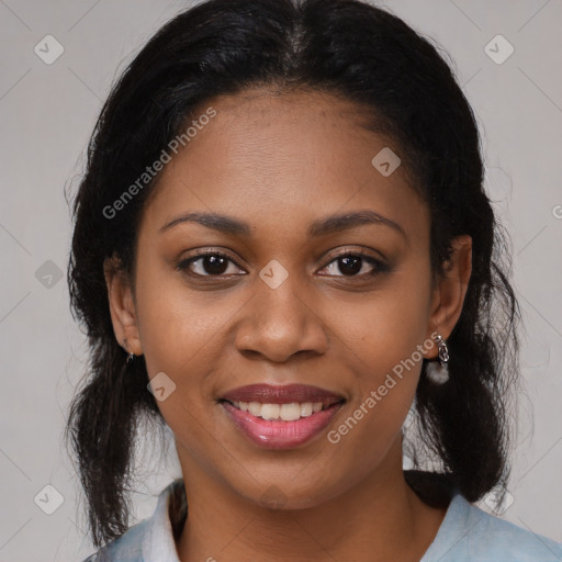 Joyful latino young-adult female with medium  brown hair and brown eyes