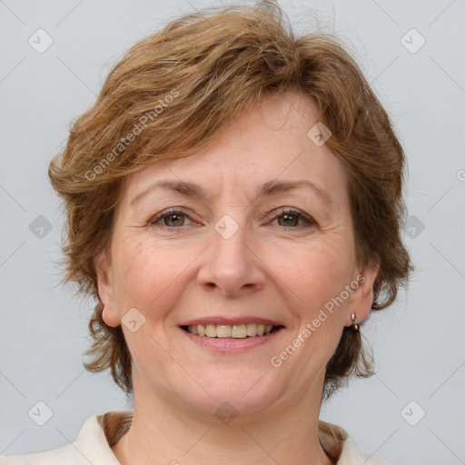 Joyful white adult female with medium  brown hair and grey eyes