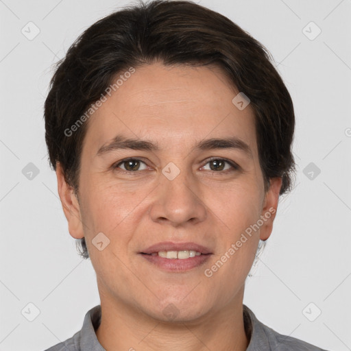 Joyful white adult male with short  brown hair and brown eyes