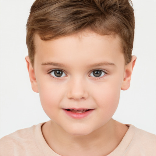 Joyful white child male with short  brown hair and brown eyes