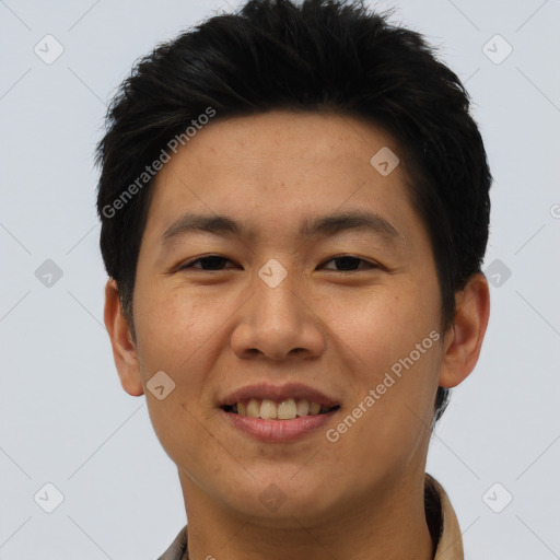 Joyful asian young-adult male with short  black hair and brown eyes