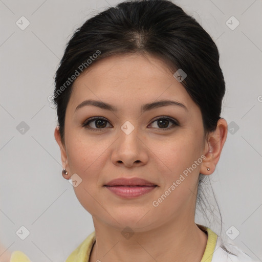 Joyful asian young-adult female with medium  brown hair and brown eyes