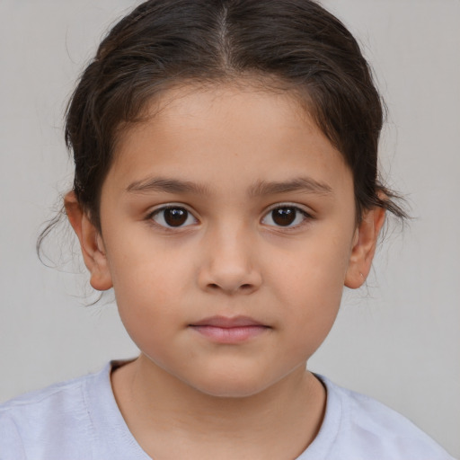 Neutral white child female with short  brown hair and brown eyes