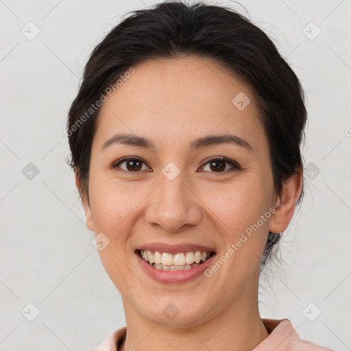 Joyful white young-adult female with short  brown hair and brown eyes