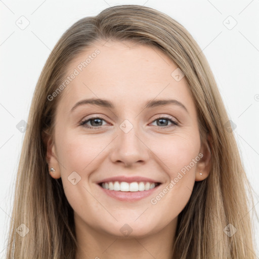 Joyful white young-adult female with long  brown hair and grey eyes