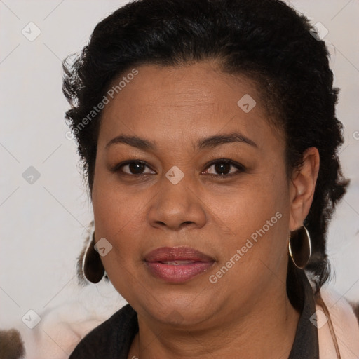 Joyful latino adult female with short  brown hair and brown eyes