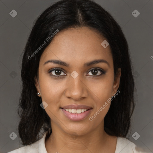 Joyful black young-adult female with medium  brown hair and brown eyes