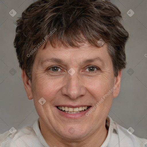 Joyful white adult female with short  brown hair and brown eyes