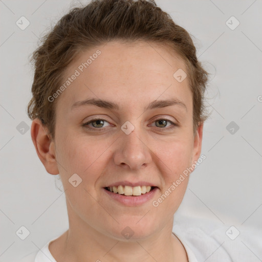 Joyful white young-adult female with short  brown hair and grey eyes