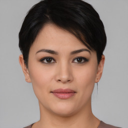 Joyful asian young-adult female with short  black hair and brown eyes