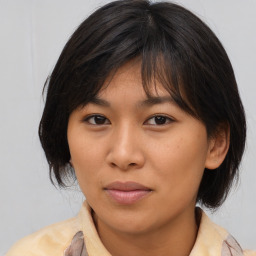 Neutral asian young-adult female with medium  brown hair and brown eyes