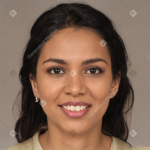 Joyful latino young-adult female with long  brown hair and brown eyes