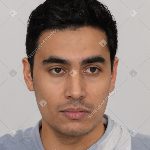 Neutral latino young-adult male with short  black hair and brown eyes