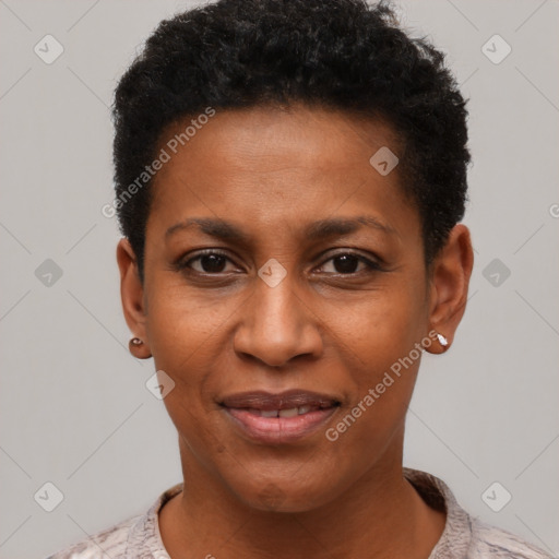 Joyful black young-adult female with short  black hair and brown eyes