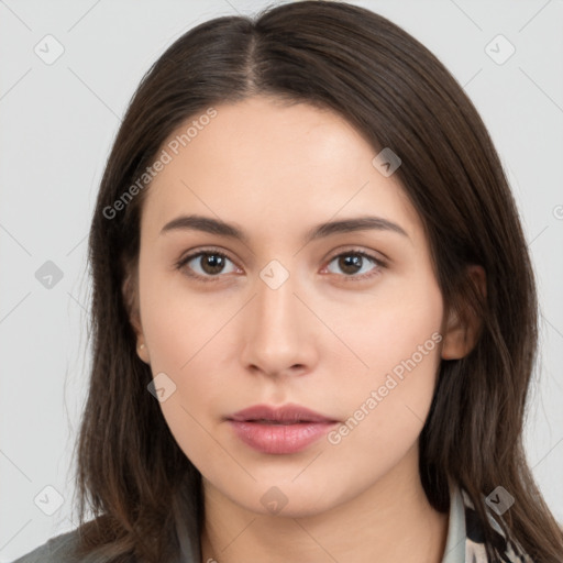 Neutral white young-adult female with long  brown hair and brown eyes