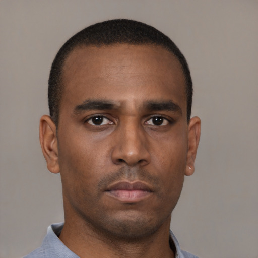 Neutral black young-adult male with short  brown hair and brown eyes