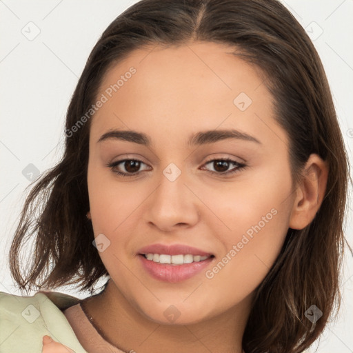 Joyful white young-adult female with long  brown hair and brown eyes